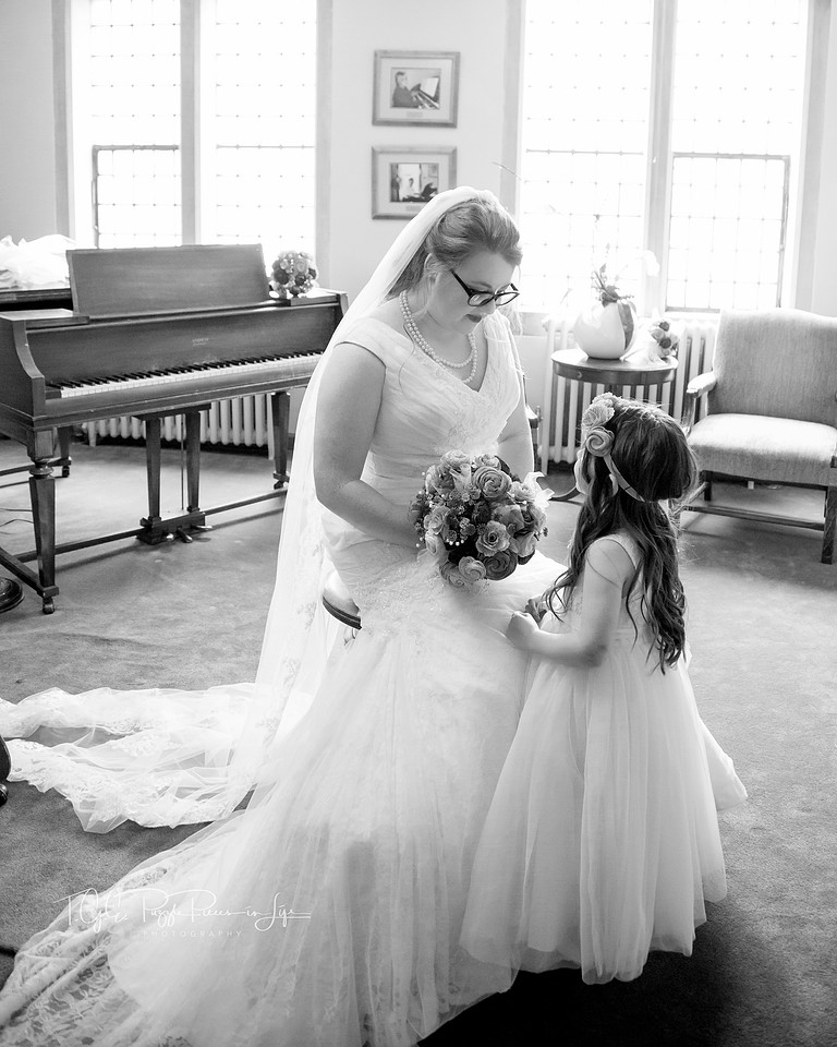 Bride's Daughter Looking at Her Mom
